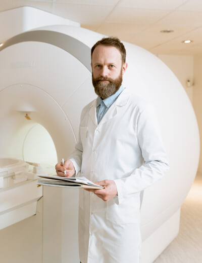 Doctor with an MRI machine